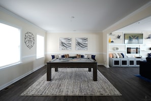 Dining room table is convertible to a ping pong or pool table.