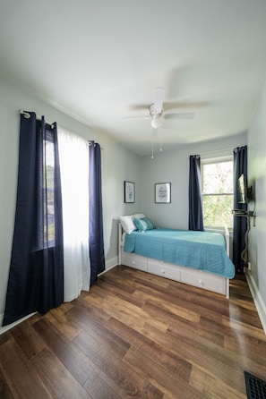 Comfortable twin bed with Roku TV.