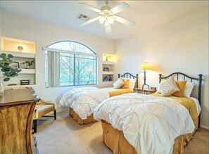 Bedroom w/ 2 twin beds, beautiful views, and a reading nook.