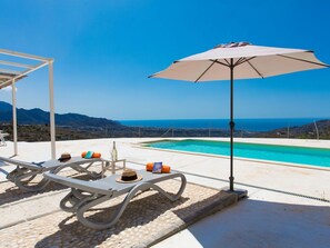 Water, Sky, Umbrella, Shade, Blue, Outdoor Furniture, Sunlounger, Wood, Coastal And Oceanic Landforms, Table