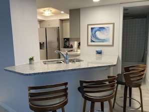 Breakfast bar overlooking the living room.