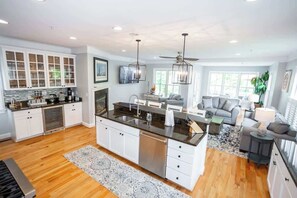 Spacious kitchen which opens to the first floor seating area. 