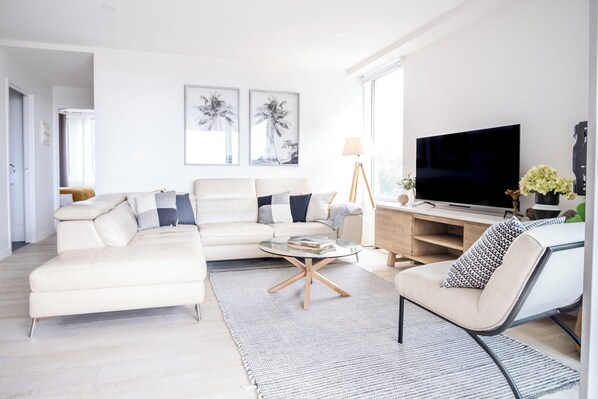 The elegant lounge room is both comfortable and practical.