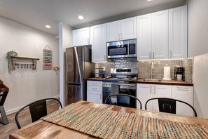 Inviting dining table in a cozy kitchen setting.