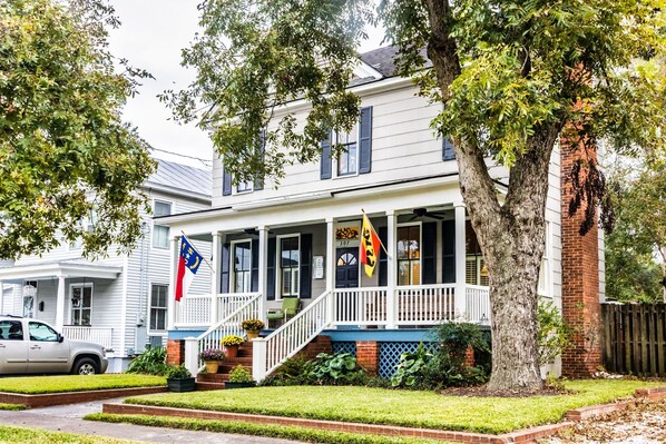 Front of house from the street. Driveway is to the left when facing the house.
