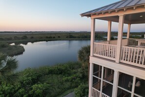 Serene lagoon and sunset views from the porches