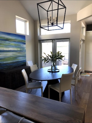 Dining area with French doors that open to the deck.