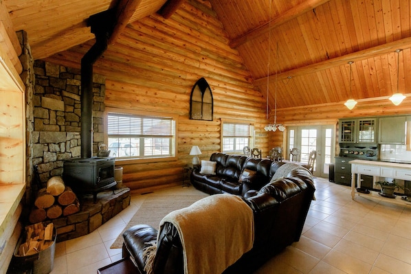 Living room with woodstove for guests to enjoy. 