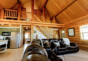 Looking up to the loft with 1 Queen and 1 Full bed and full bathroom.