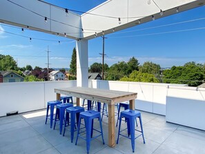 Enjoy a sunset cocktail or morning coffee on the roof deck with a stunning view.
