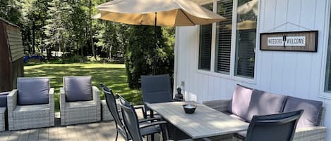 Outdoor dining area and the large yard