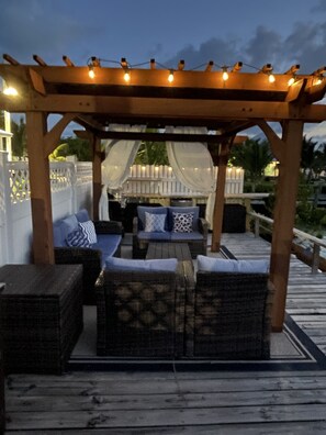 Waterfront Outdoor Living Space with BBQ, Refrigeration, and Solar Lighting