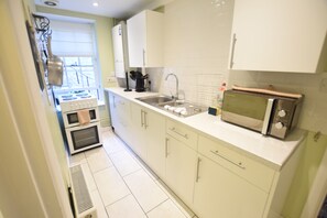 The fully-equipped kitchen in our holiday home in Ryde, Isle of Wight