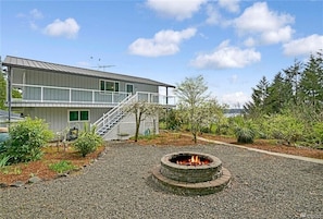 fire pit and yard space for tenting and playing