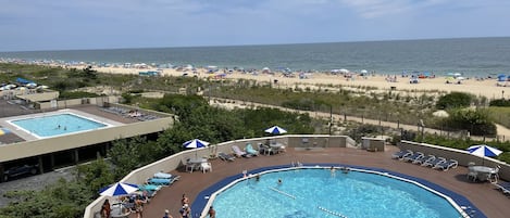 Oceanfront pool with tables .  Bring your lunch or dinner