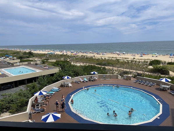 Oceanfront pool with tables .  Bring your lunch or dinner