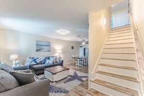 Living room and stairs to second floor