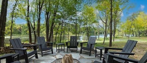 Beautiful 8 Person Fire Pit with Stunning Lake Views - Complete with sturdy adirondack chairs and unlimited firewood. Roast marshmallows and create lasting memories!