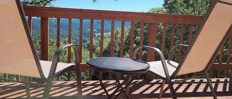 Enjoy your favorite beverage on your private deck just off the master bedroom.