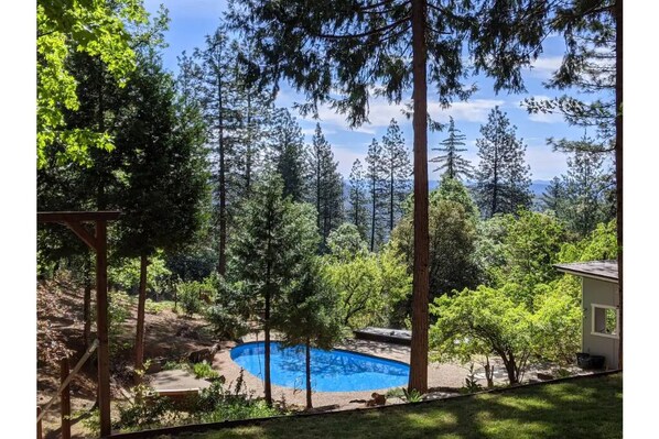 In-ground pool with a view of the Sierra Nevada mountains.