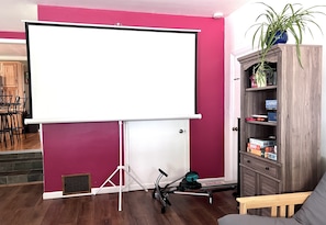 Large projection screen for watching movies or your favorite shows.