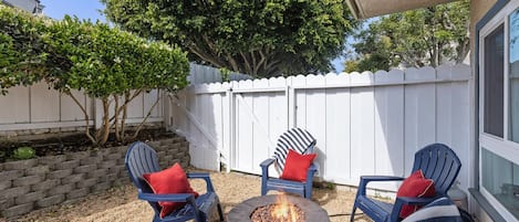 Private rear yard with firepit