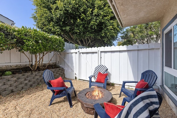 Private rear yard with firepit