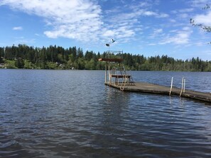 Our dock with 2 diving platforms.  The water is ~10 feet deep at the end of the dock and wonderful to swim and dive into (feet first for safety).  It is also a great fishing dock if you like to catch bass, trout, bluegill, and crappie.