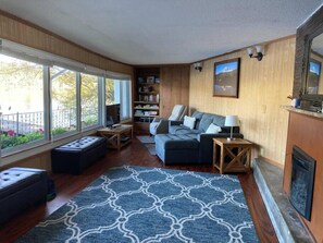 Welcome! We hope you enjoy the wall to wall windows in the living room as much as we do!