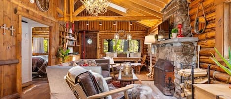 Living Room with wood burning fireplace.