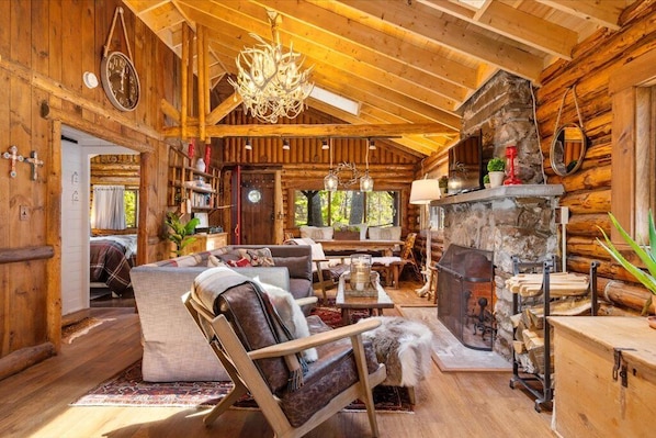 Living Room with wood burning fireplace.