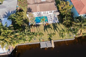 Large back yard on a canal with access to Lake Eden and Lake Ida