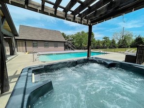 Relaxing hot tub off the pool area.