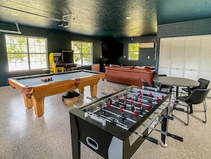 Game room - pool table and foosball table. 