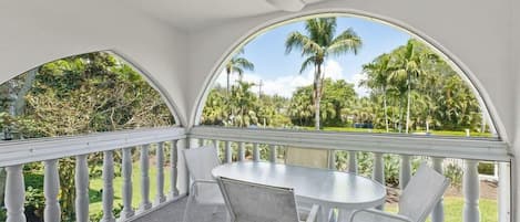 Patio overlooking pool and grounds