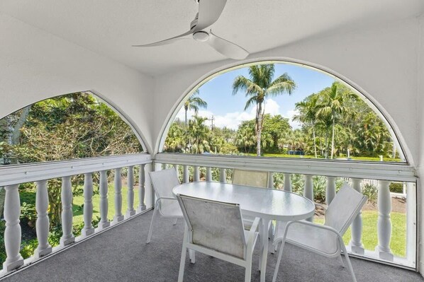 Patio overlooking pool and grounds