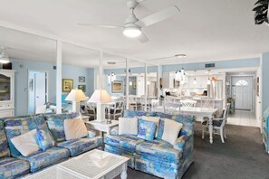 Living room features a queen sleeper sofa