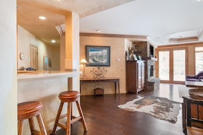 Convenient kitchen is fully equipped for at-home meals and snacks.