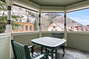 Enjoy the fresh air and mountain views from the balcony.