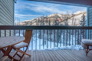 Private balcony with mountain views.