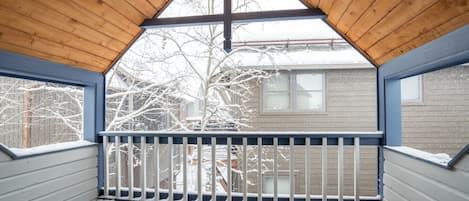 Watch the snow fall from the covered patio.