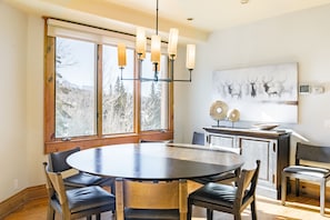 Dining area with a tree view.