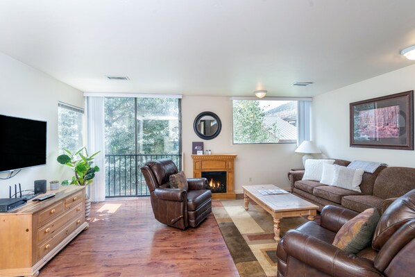 Living area with a fireplace to keep you warm.