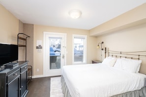 Primary bedroom features a queen bed.