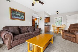 Quality Time - The open, airy great room is large enough to accommodate the whole family, and company too. The leather sectional is an especially comfortable spot for stretching out and watching TV… or treating yourself to a nap.