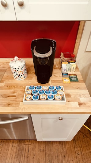 Keurig with creamer, coffee pods, decaf singles, regular and decaf teas & sugars