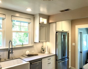 Bosch dishwasher, GE refrigerator, all new - backroom leads outside