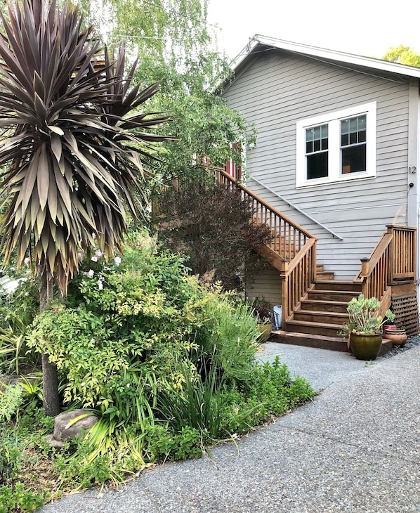 Front of house - flat upper. Quiet single neighbor in lower flat. Close to creek