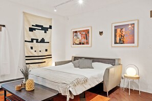 American Sleeper Sofa by Design Warehouse (no spring super comfy memory foam mattress.)