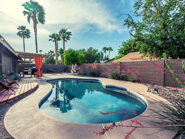 Relaxing pool with lounge chairs. 